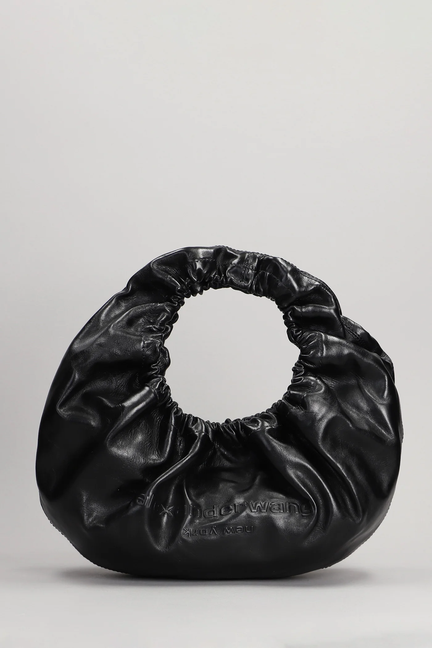 Crescent Hand bag in black leather