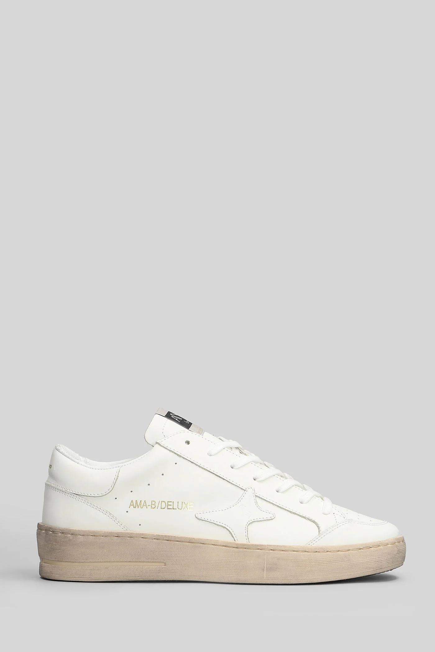 Sneakers in white leather