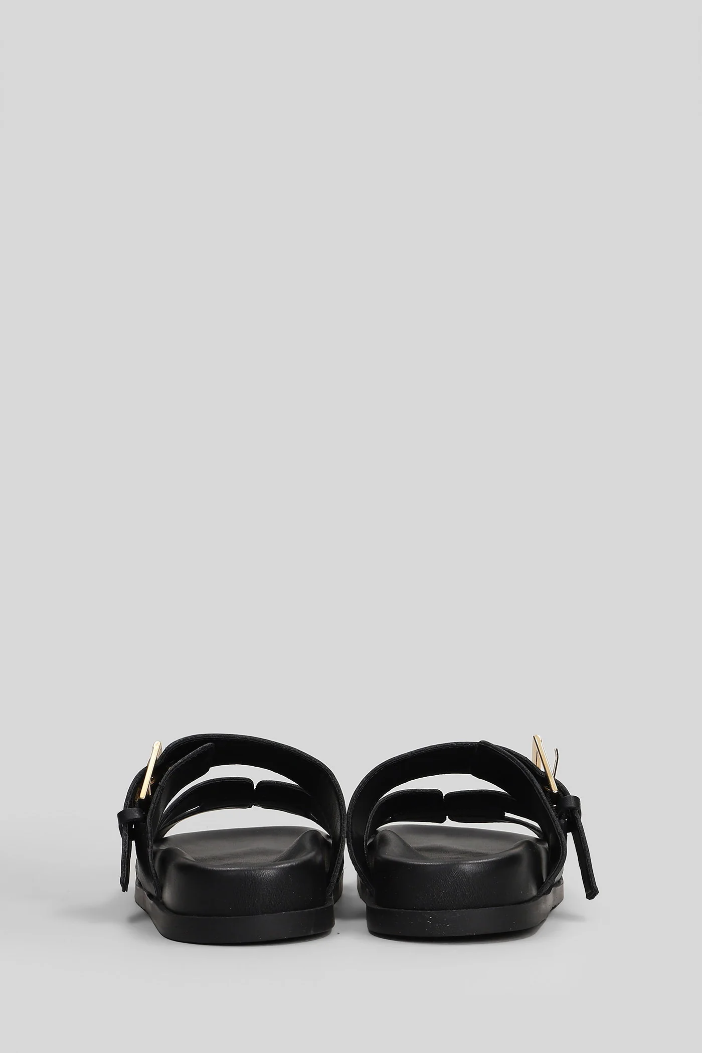 Flat sandal-slipper in black leather - Image 4