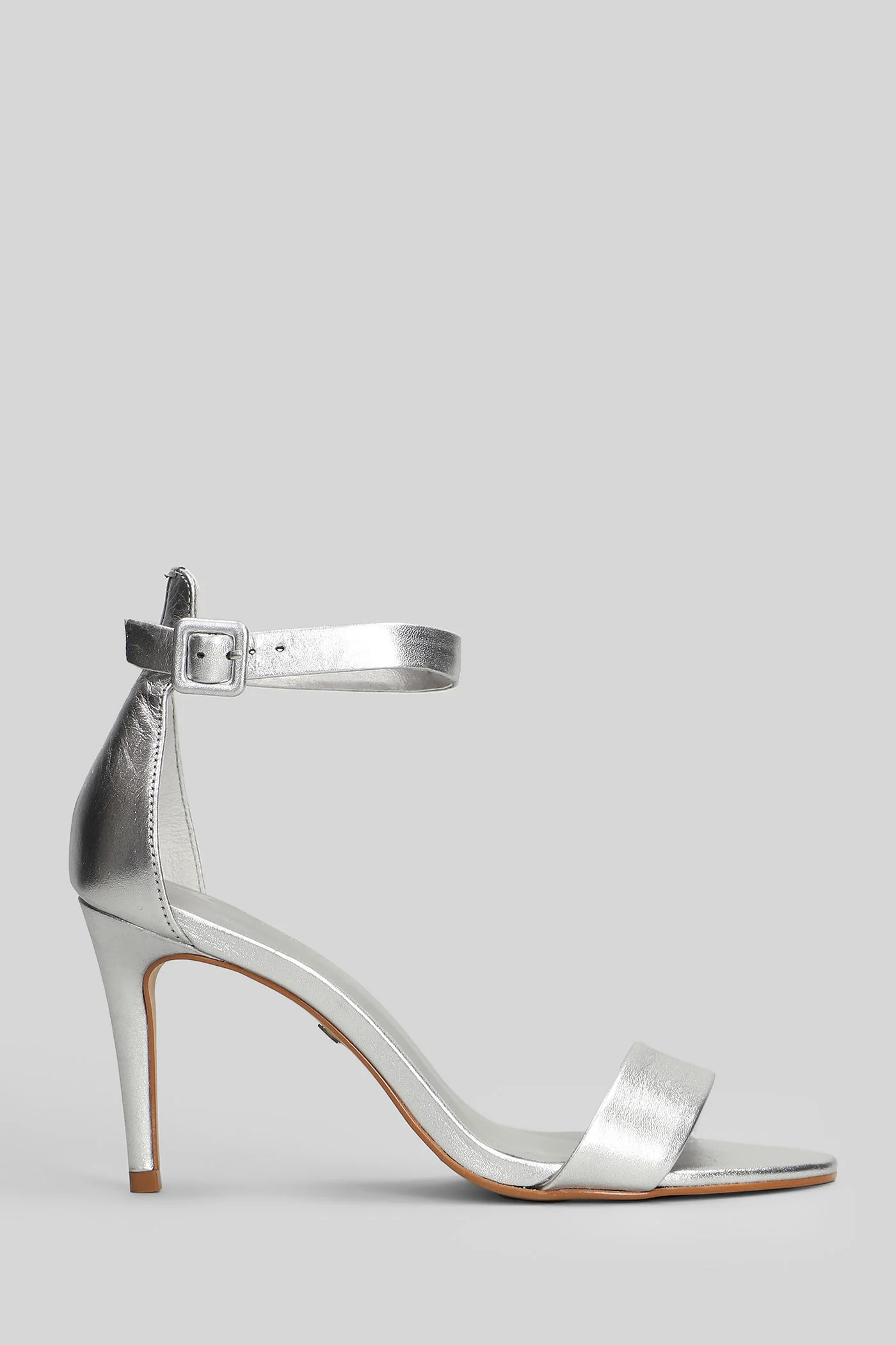 Sandals in silver leather