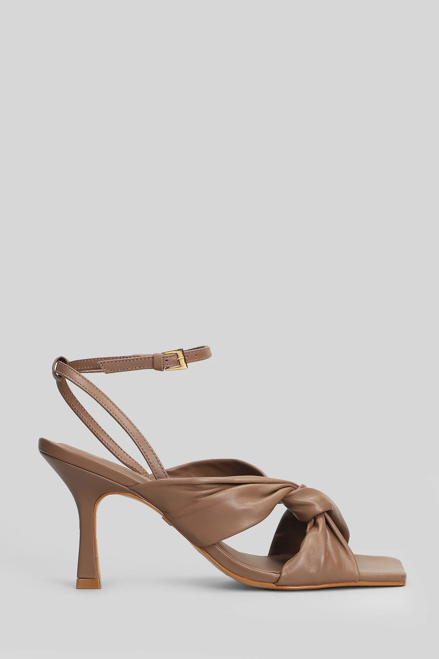 Sandals in taupe leather