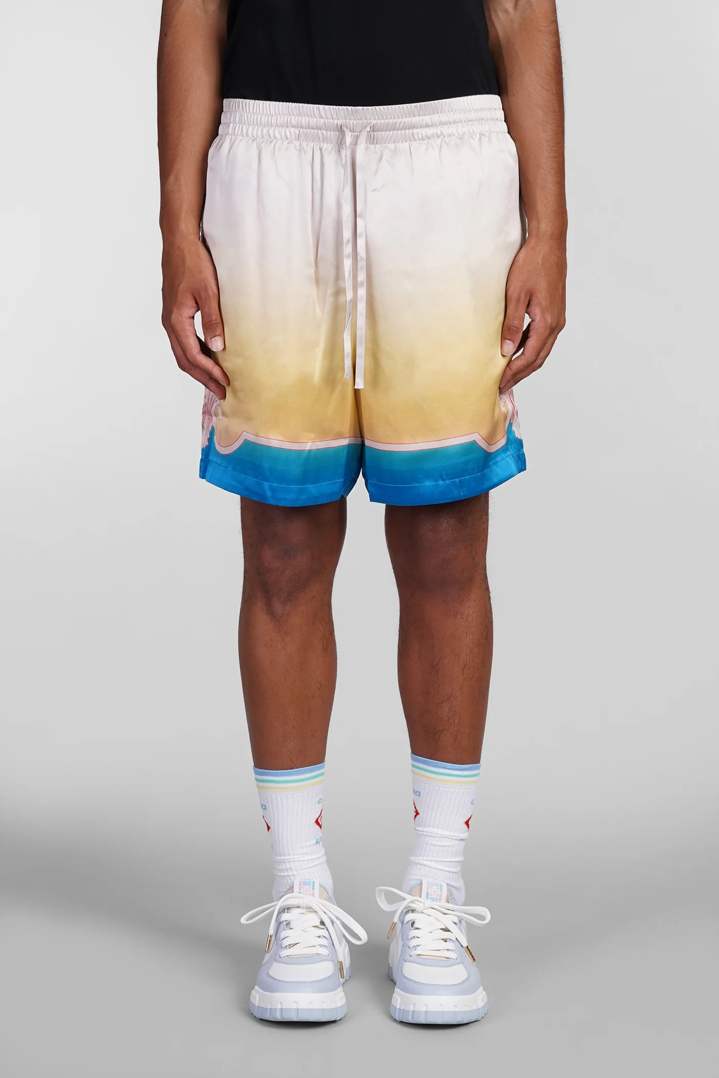 Shorts in beige silk