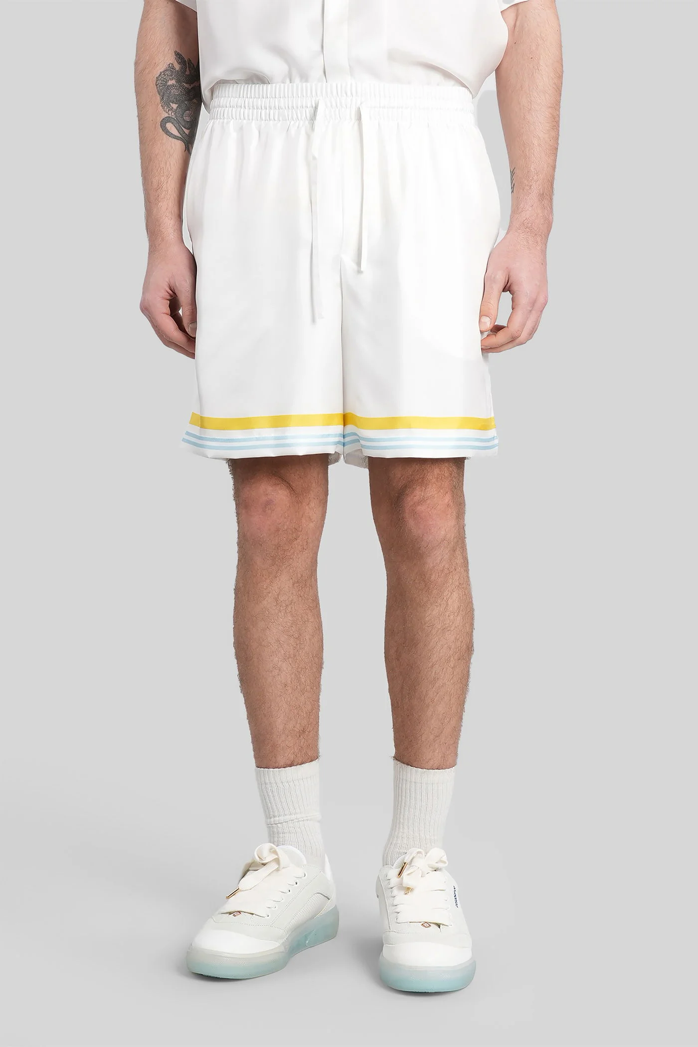 Shorts in white silk