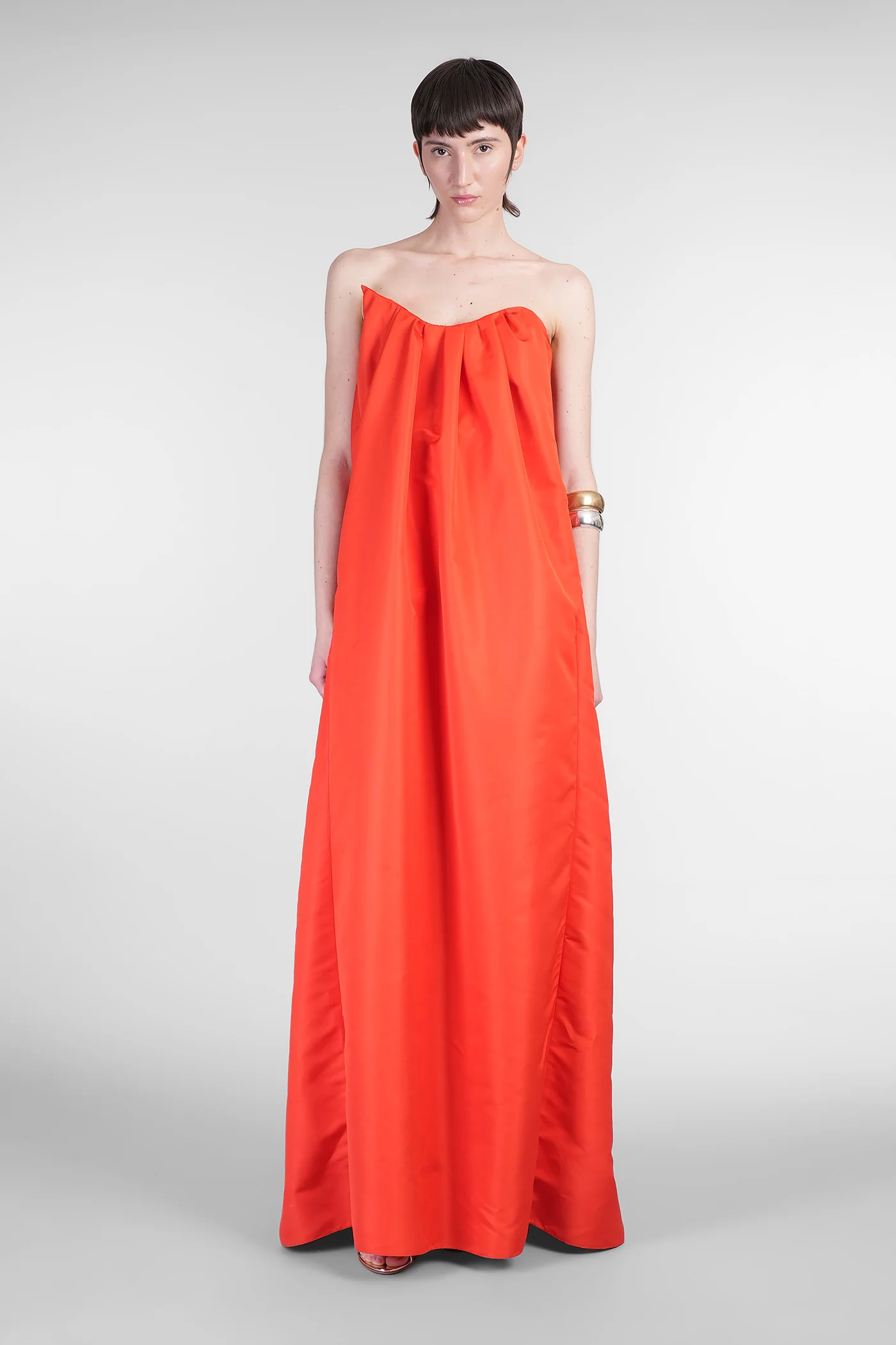Long dress in orange polyester