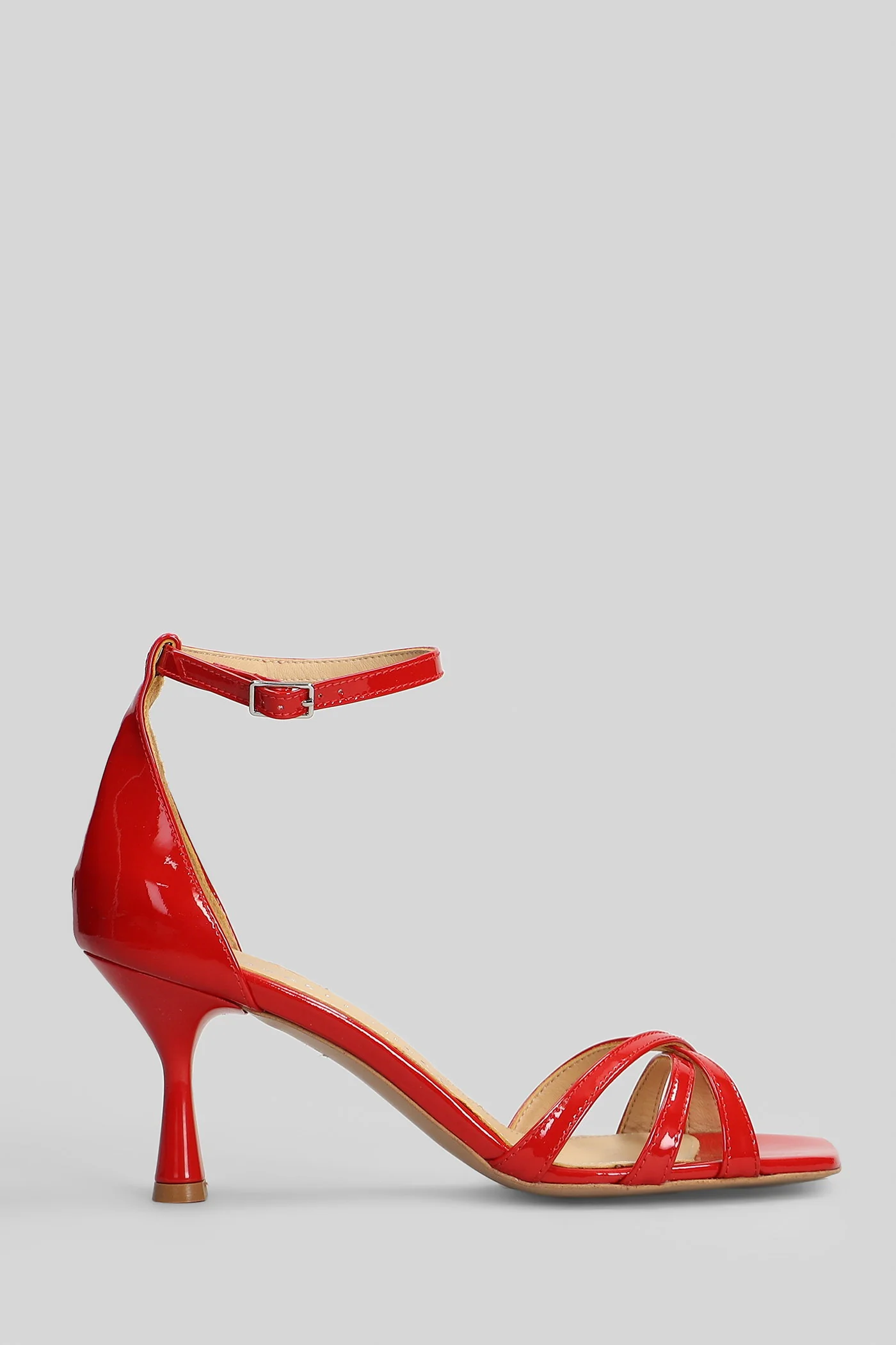 Sandals in red patent leather