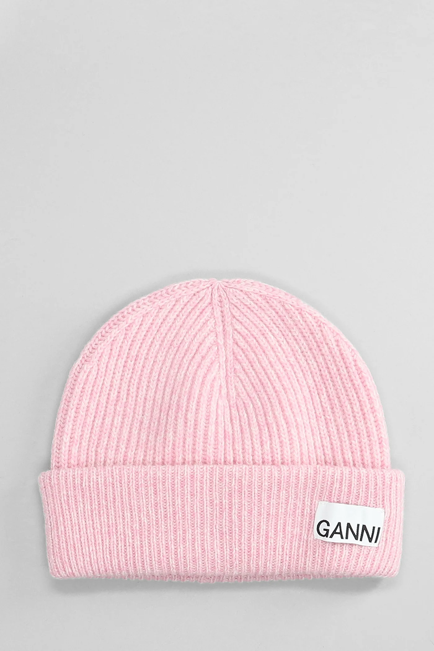 Hats in rose-pink wool