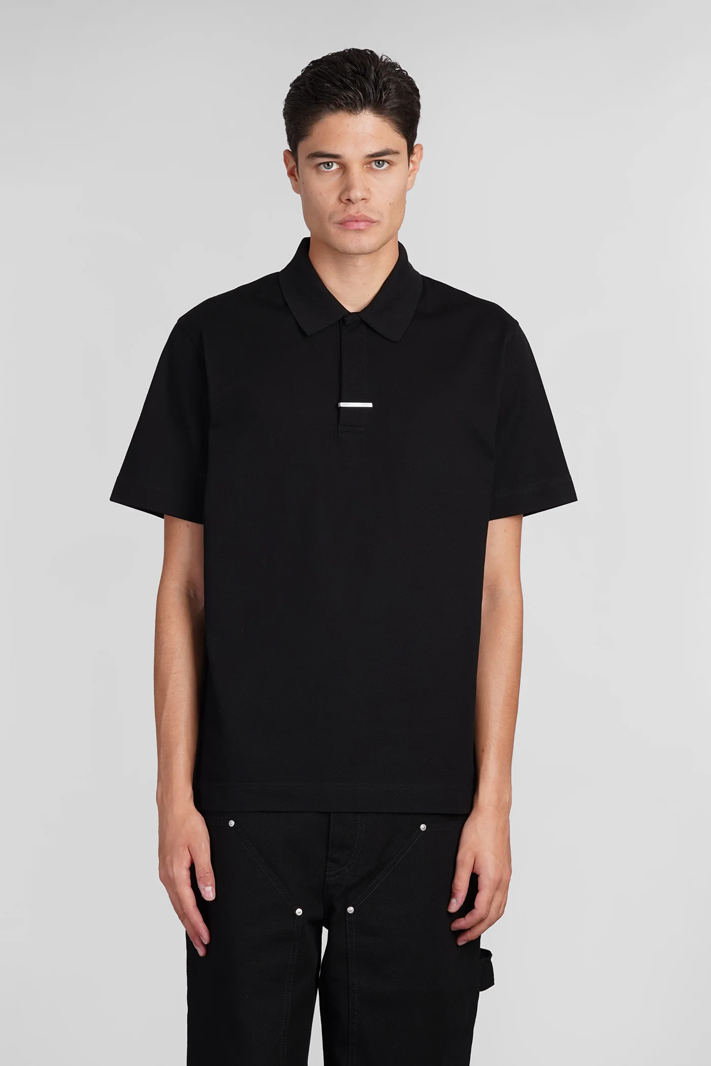 Polo in black cotton
