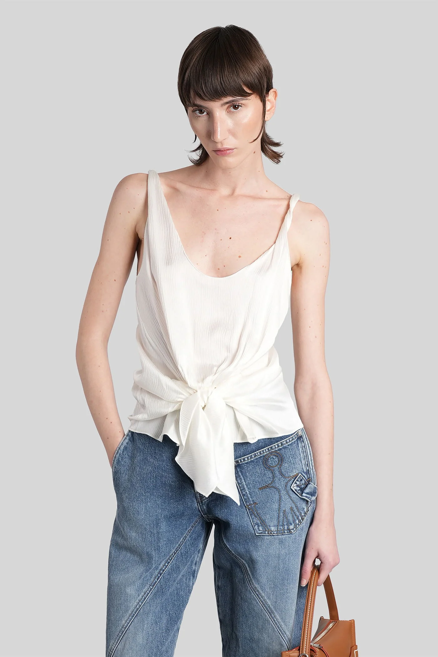 Topwear in white silk
