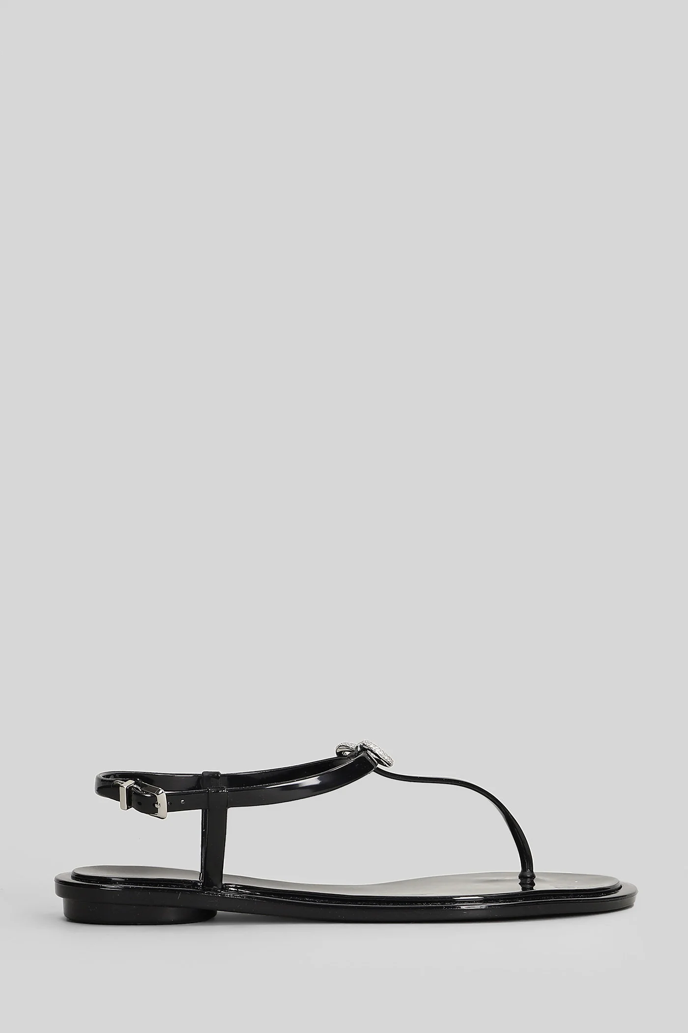 Flat sandal-slipper in black PVC