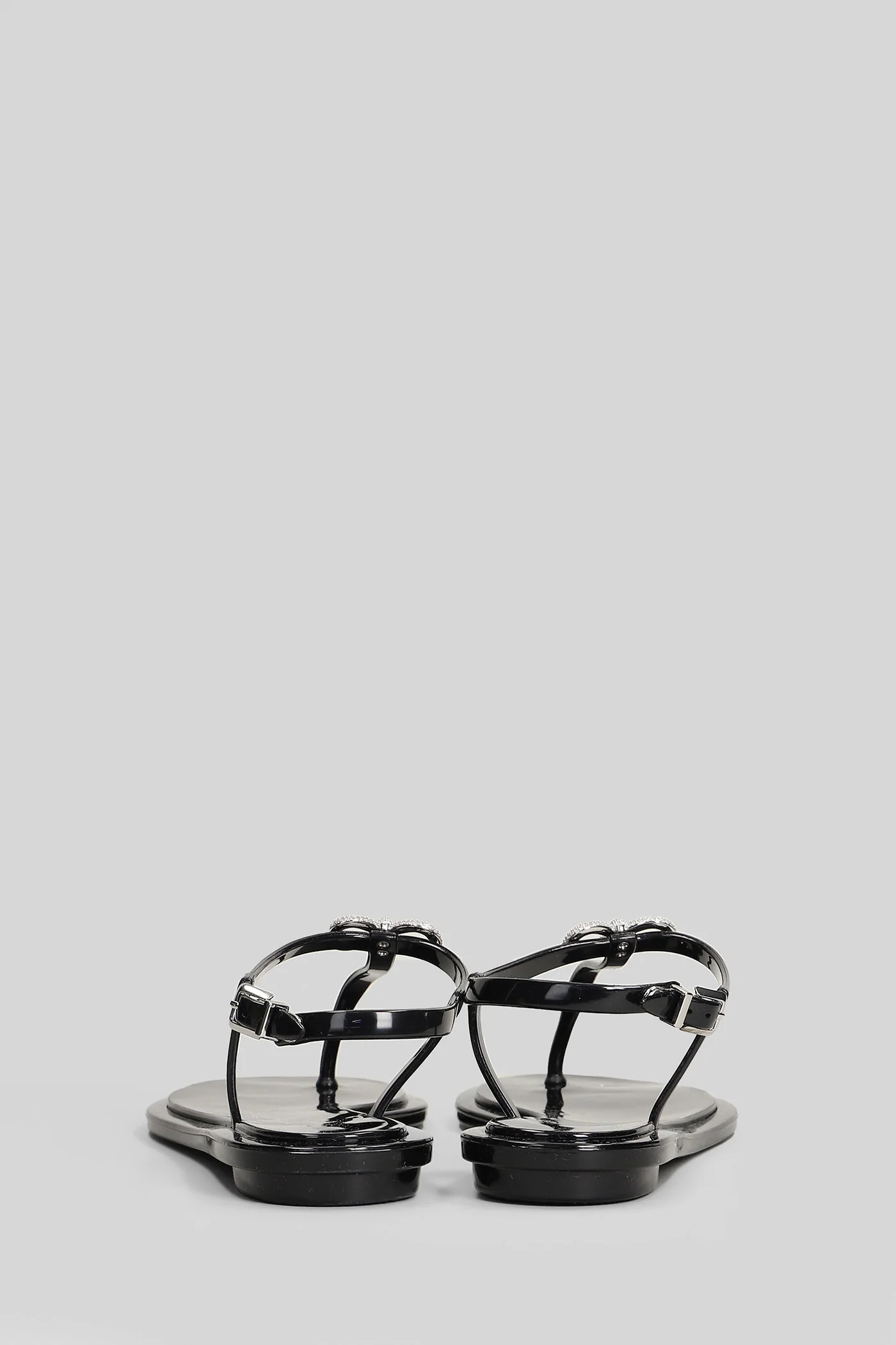 Flat sandal-slipper in black PVC - Image 4