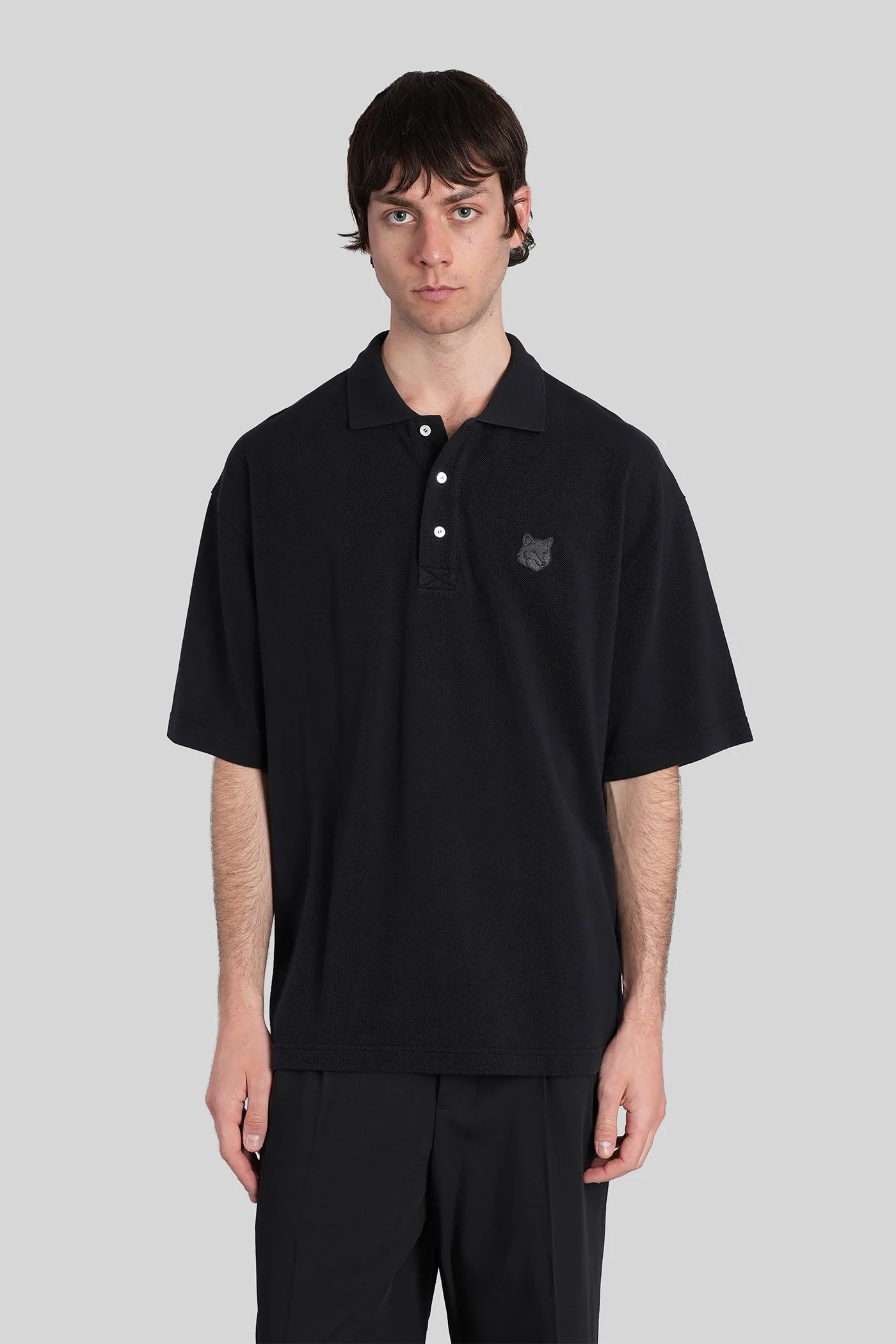 Polo in black cotton