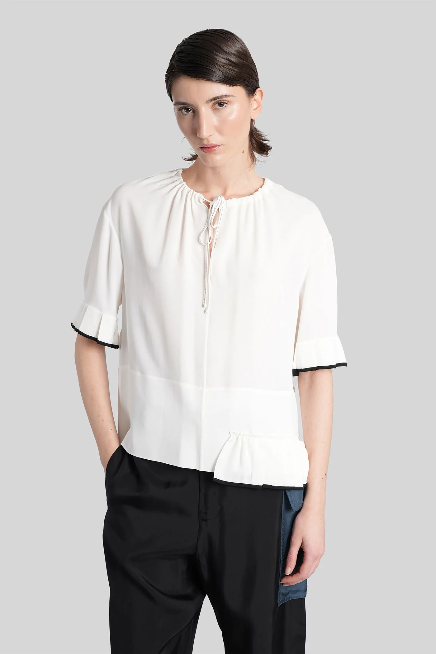 Blouse in white silk