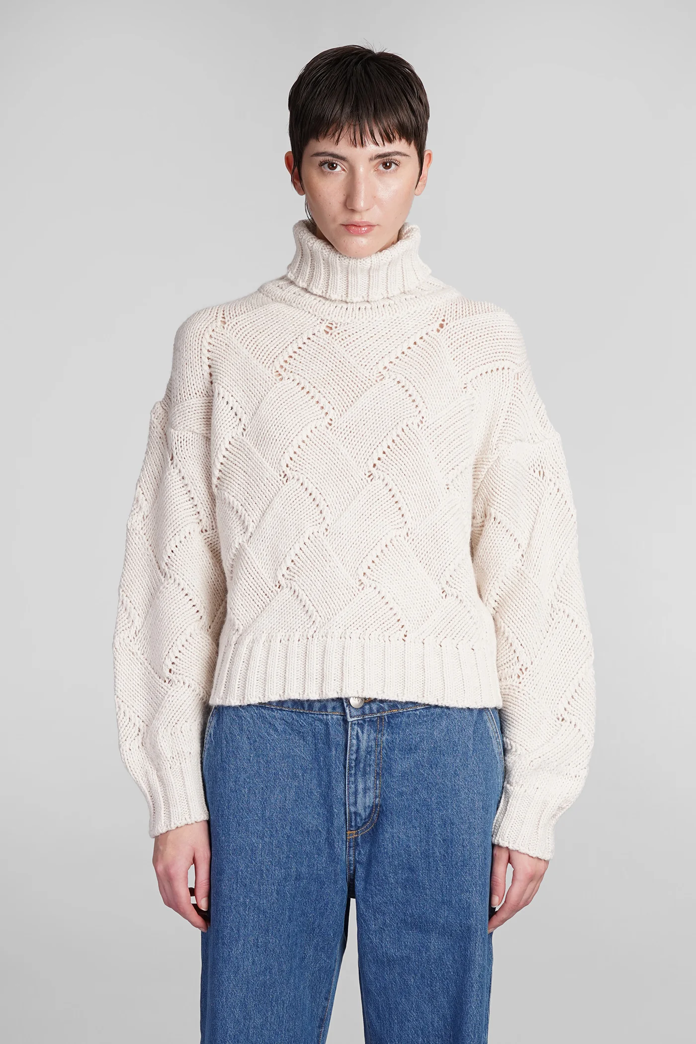 Trigger Knitwear in beige acrylic