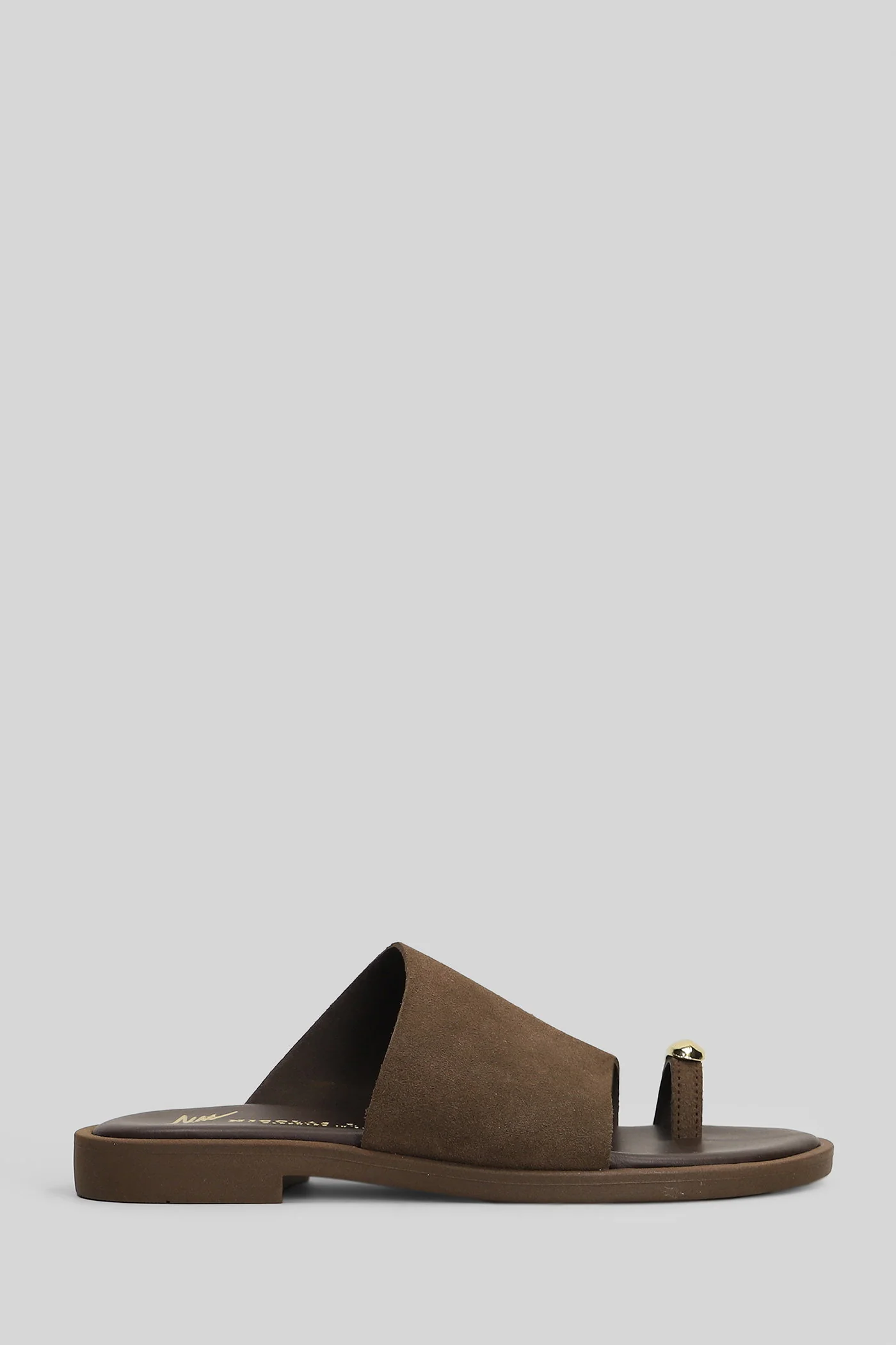 Flat sandal-slipper in brown suede