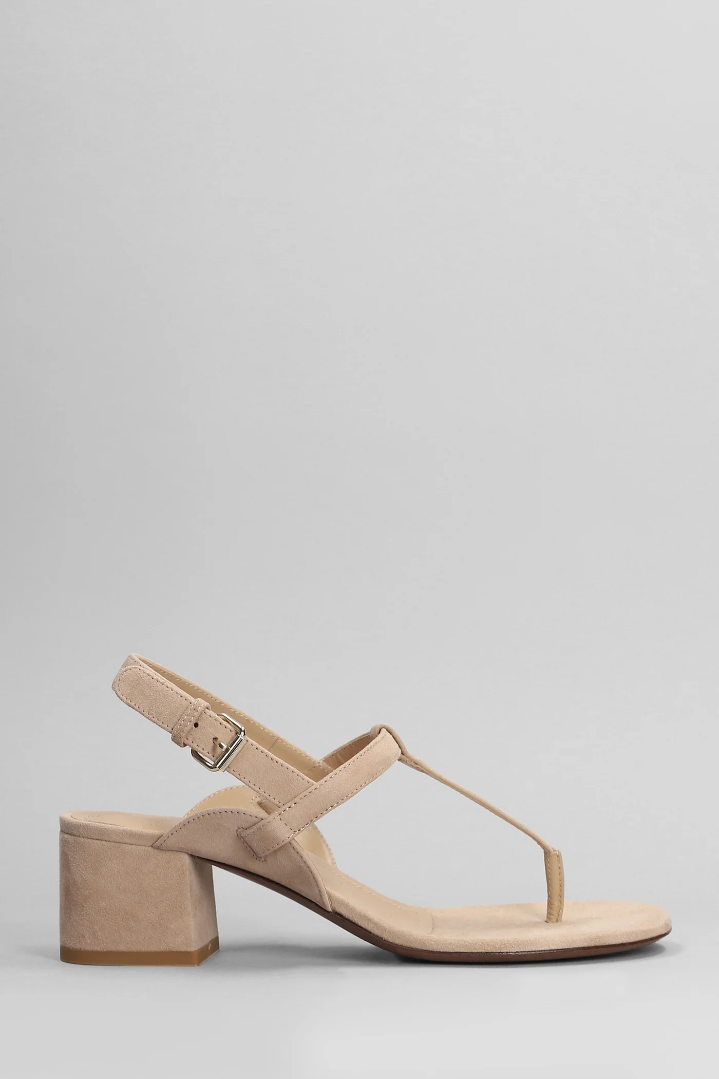 Sandals in beige suede
