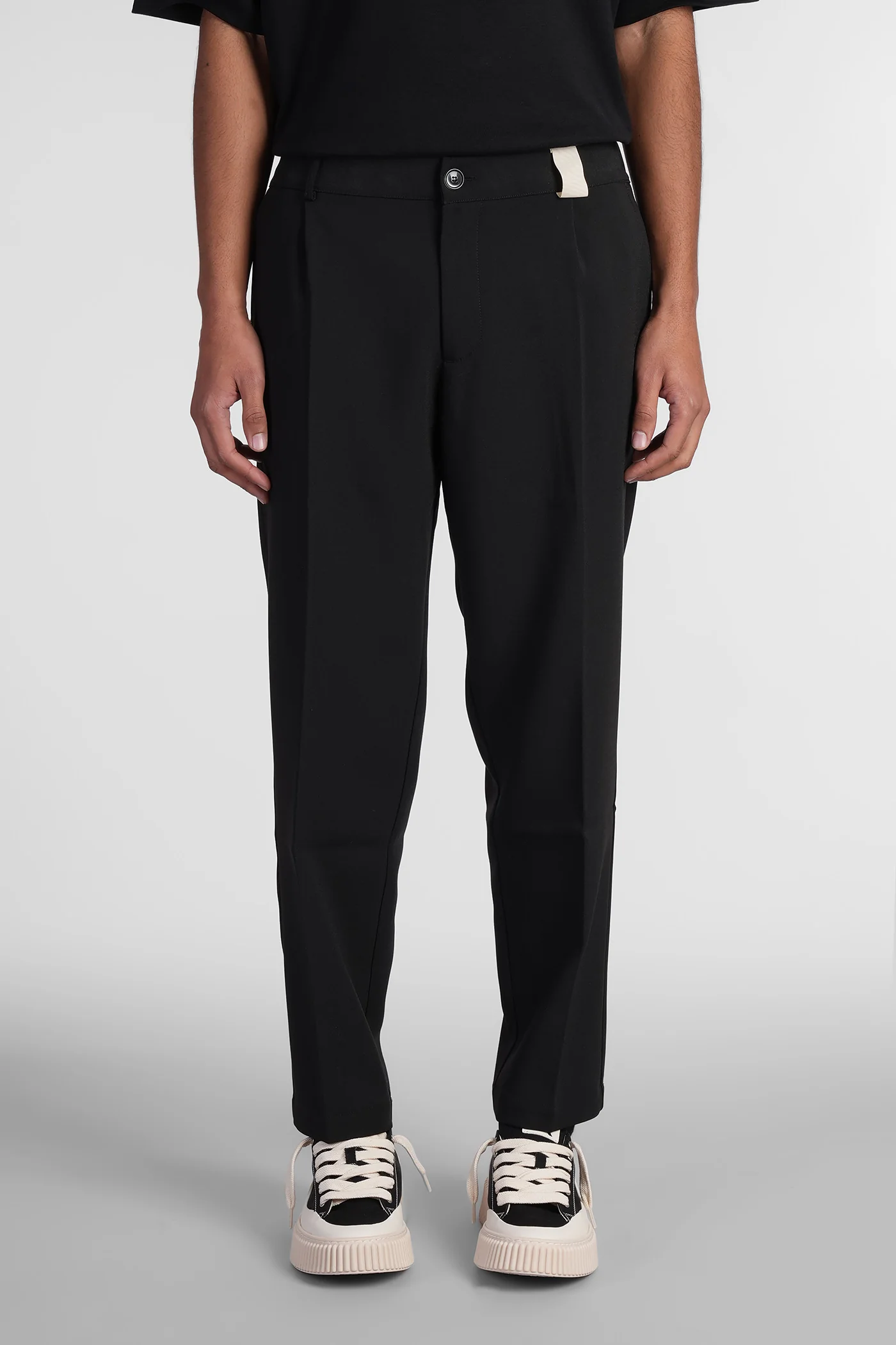 Pants in black polyester