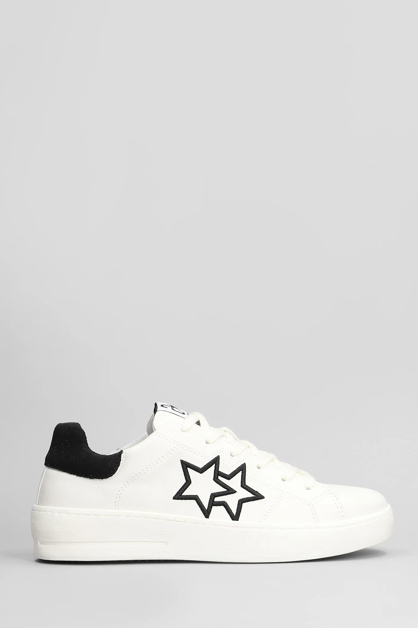 Sneakers in white suede and leather