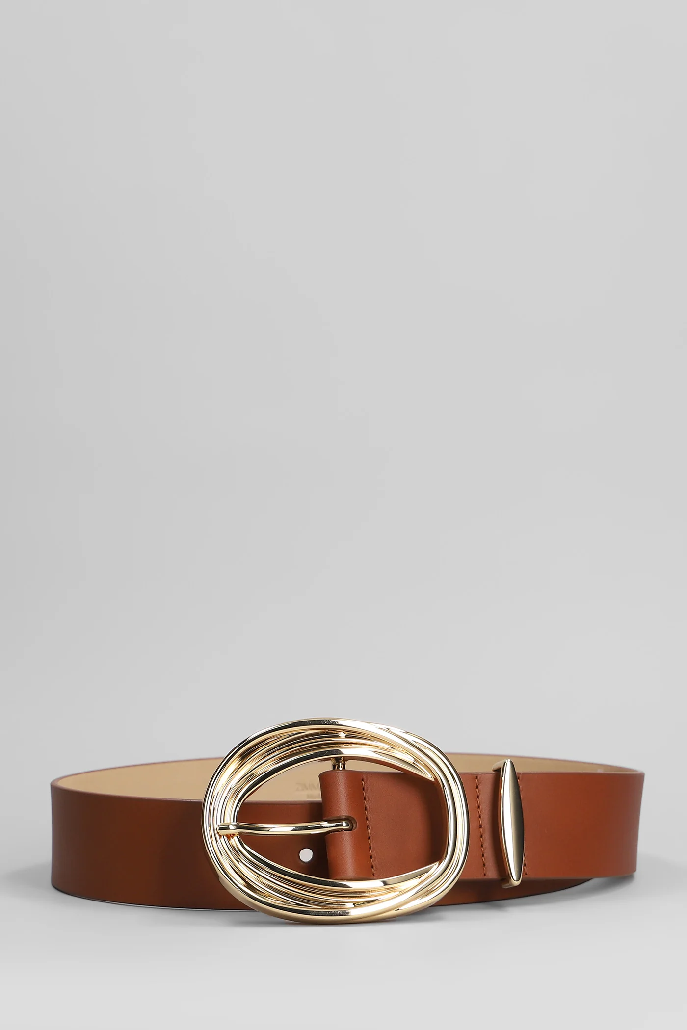 Belts in brown leather